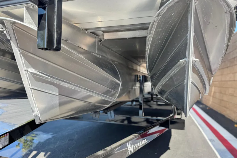 Slide: The Image of 2025 Manitou EXPLORE 26 pontoon boat underside view, showcasing aluminum construction. - 4
