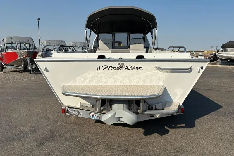 Slide: The Image of 2006 North River 21 Commander 212 Pump boat, rear view in a parking lot. - 3