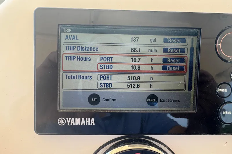 Slide: The Image of Yamaha boat display showing trip data: 66.1 miles, 137 gallons, 2011 Pursuit S 280 Sport. - 33