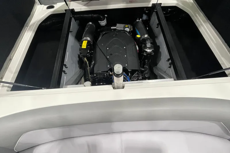 Slide: The Image of Engine compartment of a 2007 Centurion Cyclone C4 boat, showcasing the engine and interior details. - 9