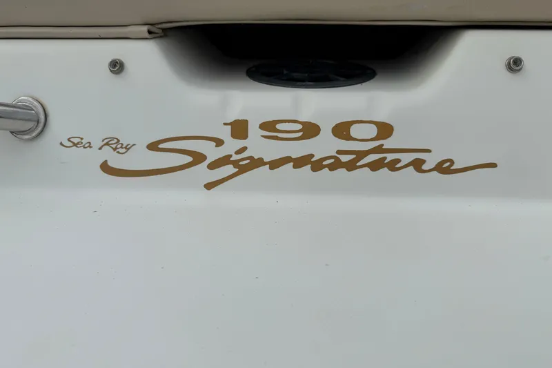Slide: The Image of 1998 Sea Ray 190 Bow Rider Signature logo on boat exterior. - 18
