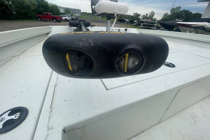 Slide: The Image of 2021 Crestliner 2000 Bay boat with trolling motor on deck, parked outdoors. - 10