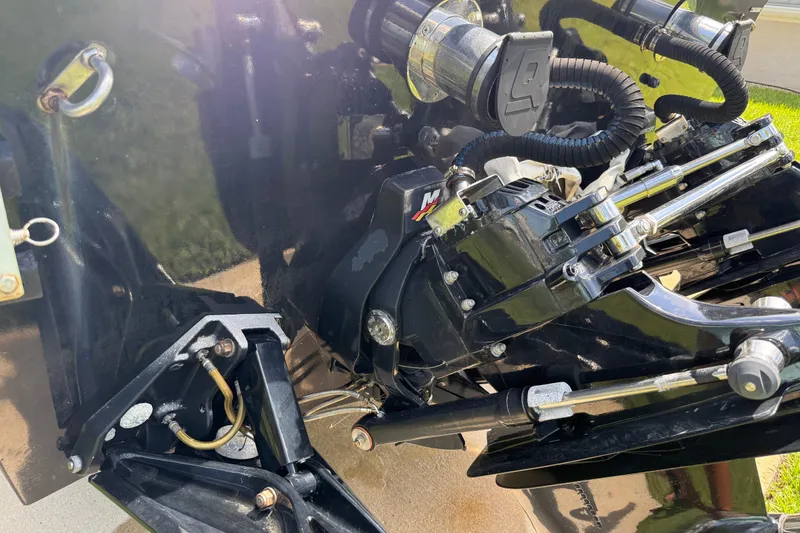 Slide: The Image of Close-up of a 2005 Apache 36CC boat engine components and hydraulic system. - 10