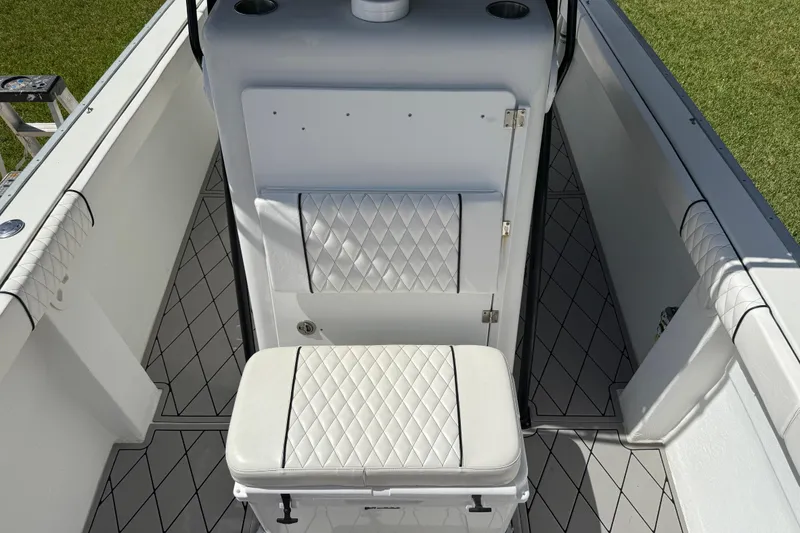 Slide: The Image of Interior of 2005 Apache 36CC boat with diamond-stitched seating and sleek design. - 23