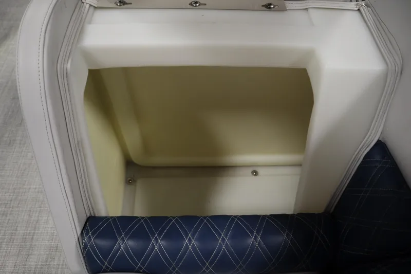 Slide: The Image of Storage compartment in 2023 Nepallo 20 CW Pontoon with white and blue upholstery. - 12