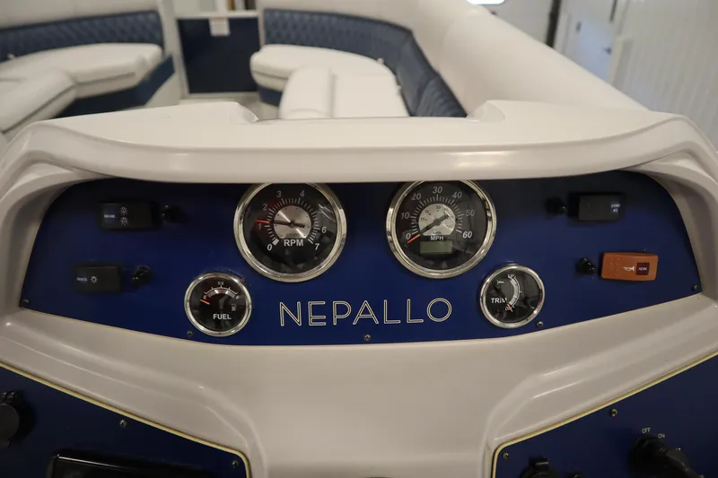 Slide: The Image of 2023 Nepallo 20 CW Pontoon dashboard with gauges and controls. - 20