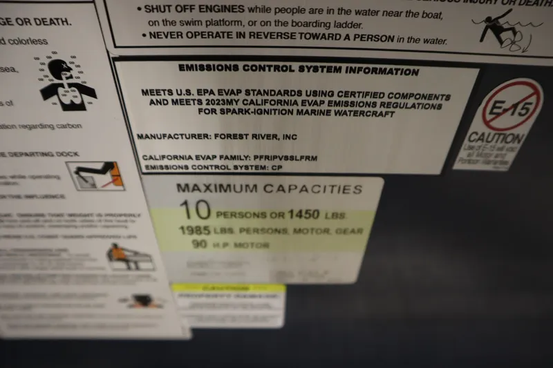 Slide: The Image of 2023 Nepallo 20 CW Pontoon capacity and emissions label, detailing safety and compliance information. - 24
