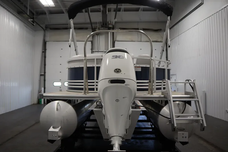 Slide: The Image of 2023 Nepallo 20 CW Pontoon boat in indoor storage facility. - 5