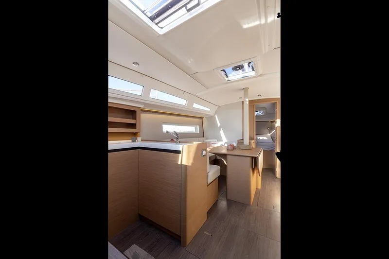 Slide: The Image of Interior of 2025 Jeanneau Sun Odyssey 380 sailboat, featuring modern design and natural light. - 15