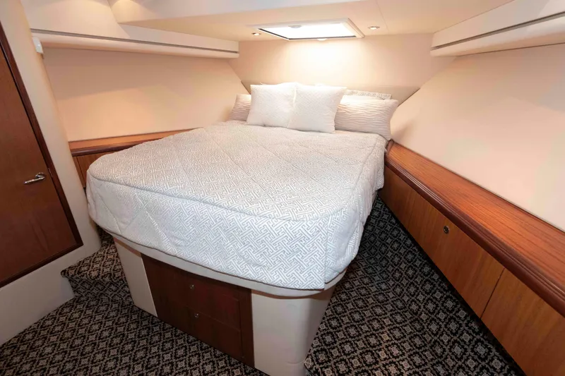 Slide: The Image of Luxurious bedroom interior of 2009 Hatteras 60 Motor Yacht with elegant bedding. - 69