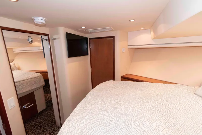 Slide: The Image of Luxurious bedroom interior of 2009 Hatteras 60 Motor Yacht with modern amenities. - 71