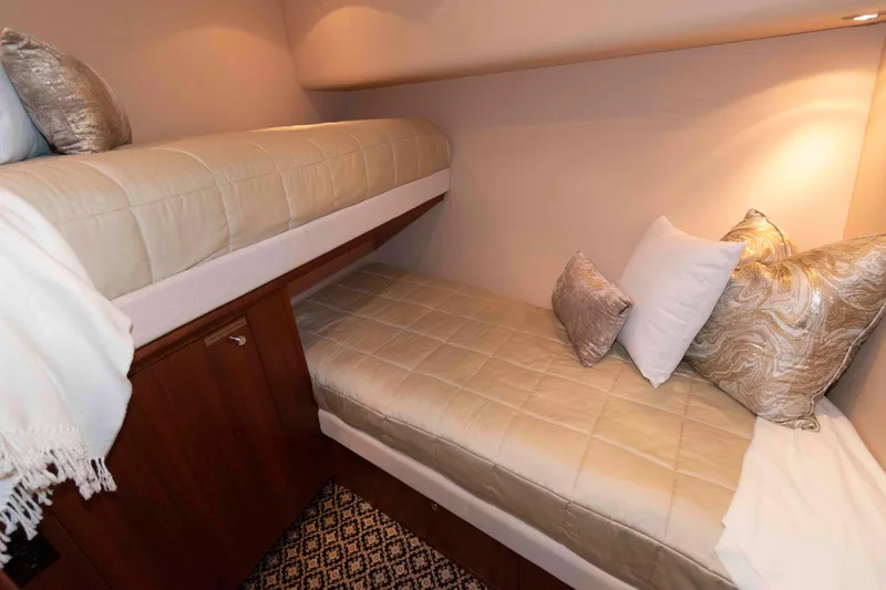 Slide: The Image of Luxurious cabin interior of 2009 Hatteras 60 Motor Yacht with cozy twin beds. - 72