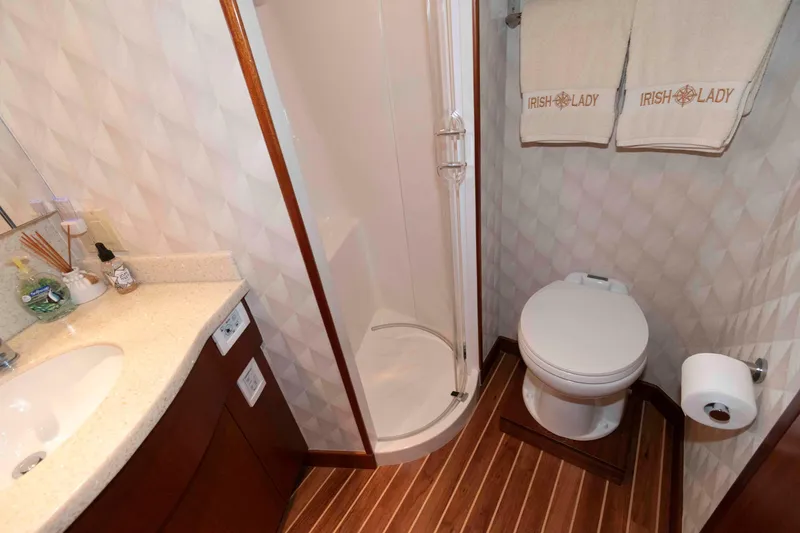 Slide: The Image of Luxurious bathroom in 2009 Hatteras 60 Motor Yacht with shower and elegant fixtures. - 74
