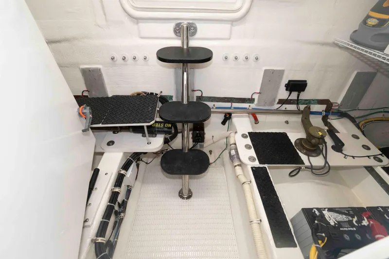 Slide: The Image of Engine room of 2009 Hatteras 60 Motor Yacht with equipment and wiring. - 84