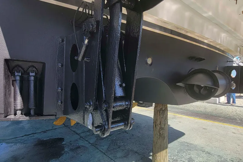 Slide: The Image of Close-up of 2009 Hatteras 60 Motor Yacht's propeller and hull components. - 87