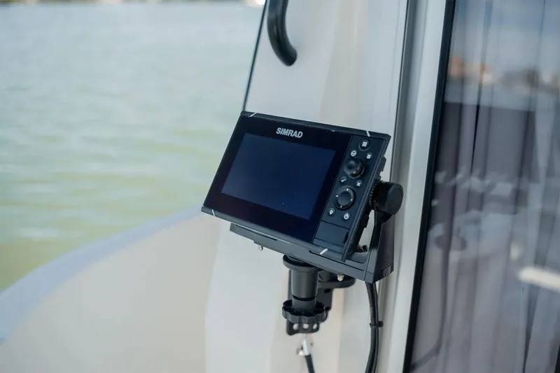 Slide: The Image of Manufacturer Provided Image: Simrad navigation system on 2025 Bayliner Trophy T25 Pilothouse boat. - 8
