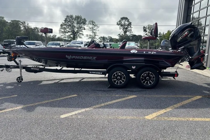Slide: The Image of 2026 Phoenix 721 ZXL boat on trailer in parking lot, side view. - 10