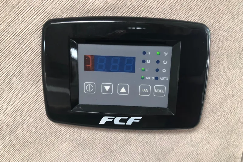 Slide: The Image of Digital control panel on a 1995 Maxum 3200 SCR boat. - 18