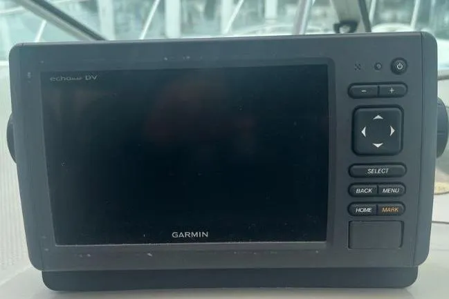 Slide: The Image of Garmin echoMAP DV device on 1995 Maxum 3200 SCR boat dashboard. - 9