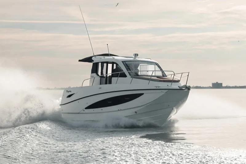 The Image of Manufacturer Provided Image: 2025 Bayliner Trophy T29 Explorer cruising on open water, creating a dynamic wake. - 0
