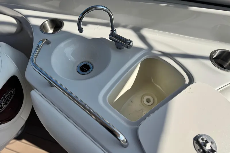 Slide: The Image of 2007 Crownline 270 BR boat sink and faucet detail. - 19
