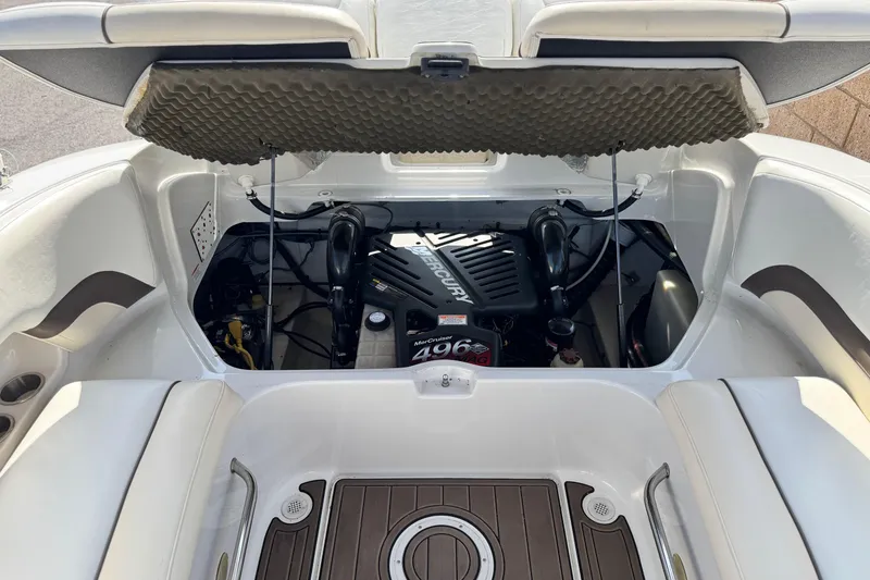 Slide: The Image of Engine compartment of a 2007 Crownline 270 BR boat, featuring a Mercury 496 MAG engine. - 23