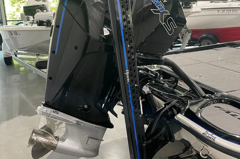 Slide: The Image of 2021 Falcon F21 boat engine and propeller in a showroom setting. - 10