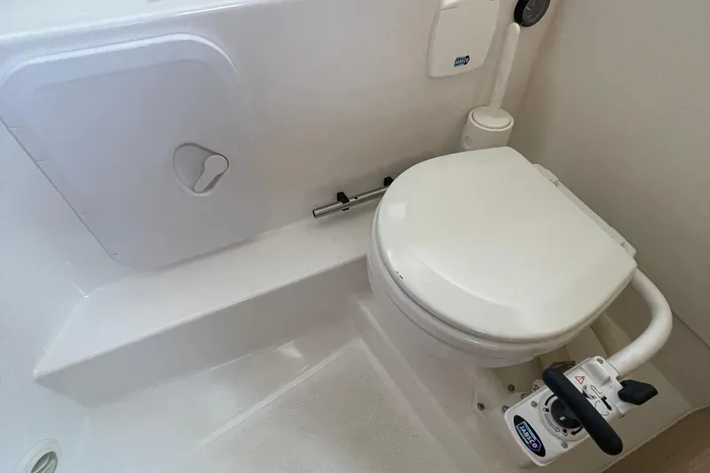 Slide: The Image of 2023 Nimbus c9-30 marine toilet with Jabsco manual pump system. - 34