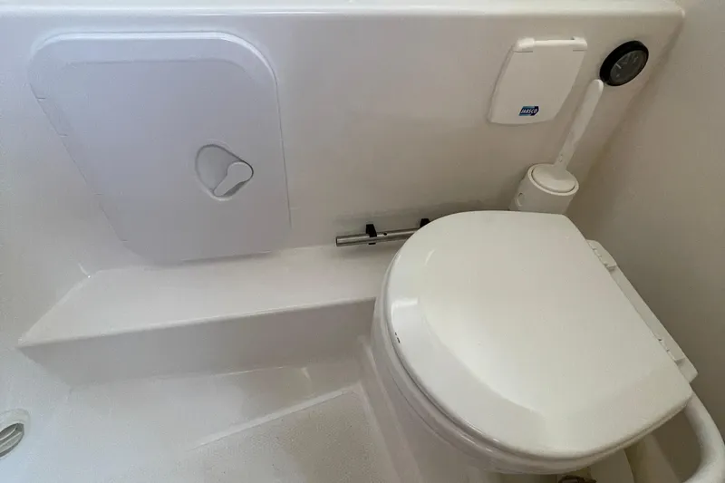 Slide: The Image of Compact bathroom in 2023 Nimbus c9-30, featuring a modern toilet and storage compartment. - 35