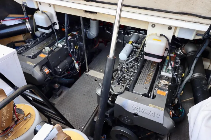 Slide: The Image of Engine room of 2006 Regal Commodore 4460 with dual Yanmar engines. - 32