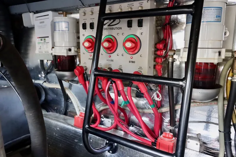 Slide: The Image of Engine room of 2006 Regal Commodore 4460 with electrical distribution panel and wiring. - 35