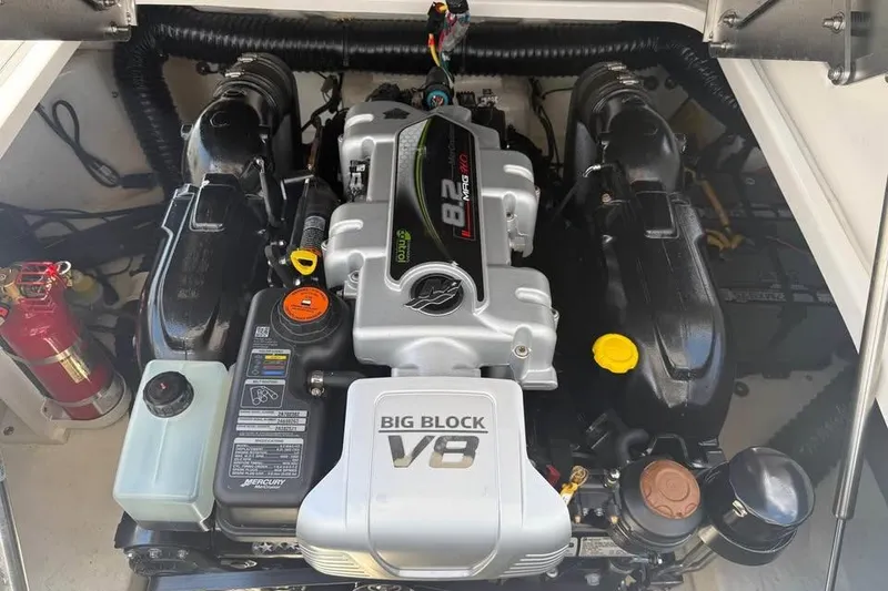Slide: The Image of 2022 Chaparral 28 Surf engine compartment featuring a powerful Big Block V8 engine. - 17