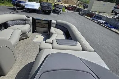 Slide: The Image of 2023 Barletta L25UCA pontoon boat interior with luxurious gray seating. - 5