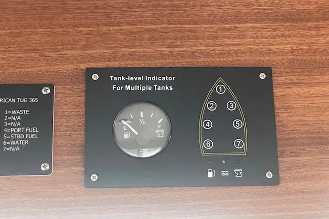 Slide: The Image of Tank-level indicator panel on 2018 American Tug 365 boat, showing multiple tank levels. - 37