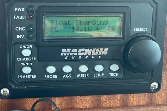 Slide: The Image of Magnum Energy charger display on 2018 American Tug 365, showing float charging status. - 38