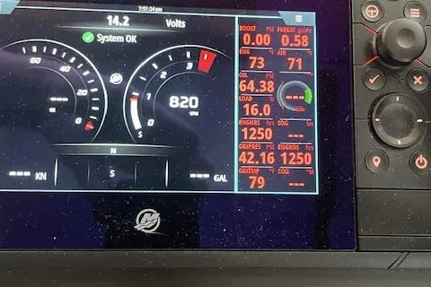 Slide: The Image of Dashboard of a 2018 American Tug 365 displaying engine metrics and system status. - 39