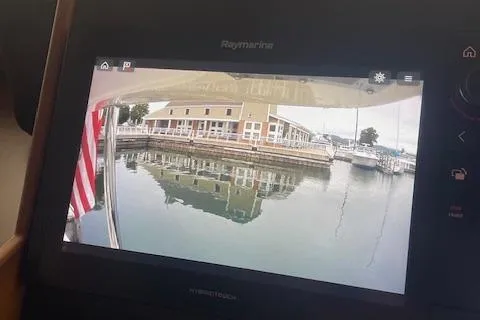 Slide: The Image of Raymarine display on 2018 American Tug 365 showing marina view with docked boats. - 40