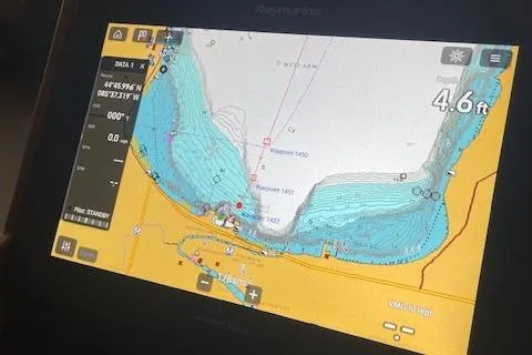 Slide: The Image of Navigation display on 2018 American Tug 365, showing depth and chart details. - 42