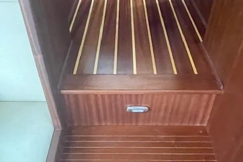 Slide: The Image of Wooden interior stairs of a 2018 American Tug 365 boat. - 46