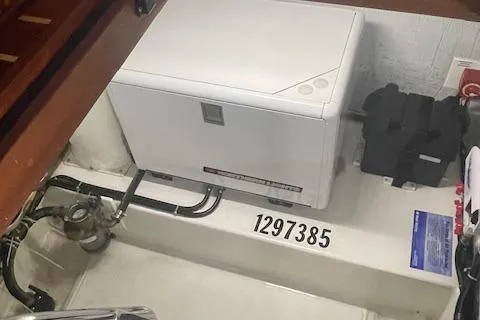 Slide: The Image of Engine room of 2018 American Tug 365 with equipment and serial number 1297385. - 49