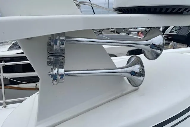 Slide: The Image of Chrome horns on 2018 American Tug 365 boat, docked in marina. - 67