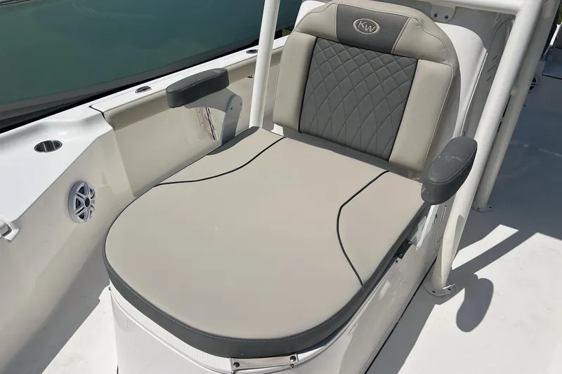 Slide: The Image of 2025 Key West 250 Bay Reef boat seat with cushioned backrest and armrests. - 18