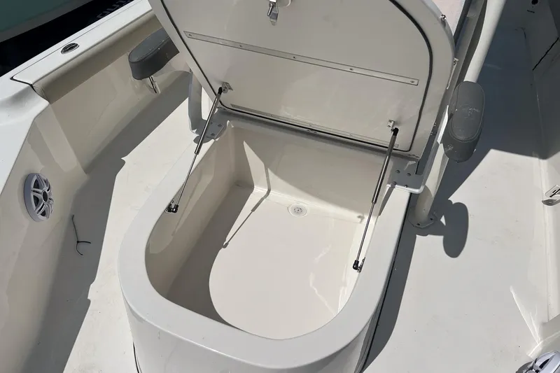 Slide: The Image of Open storage compartment on 2025 Key West 250 Bay Reef boat. - 19