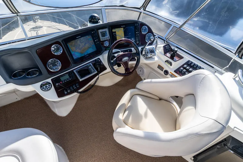 Slide: The Image of Luxurious 2009 Meridian 391 Sedan helm with advanced navigation systems and plush seating. - 11