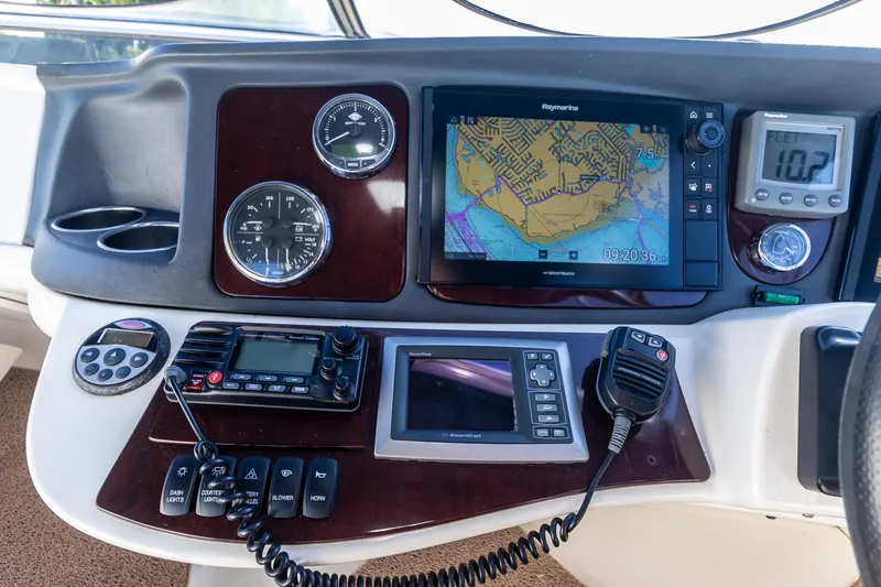 Slide: The Image of Dashboard of a 2009 Meridian 391 Sedan with navigation and communication equipment. - 14