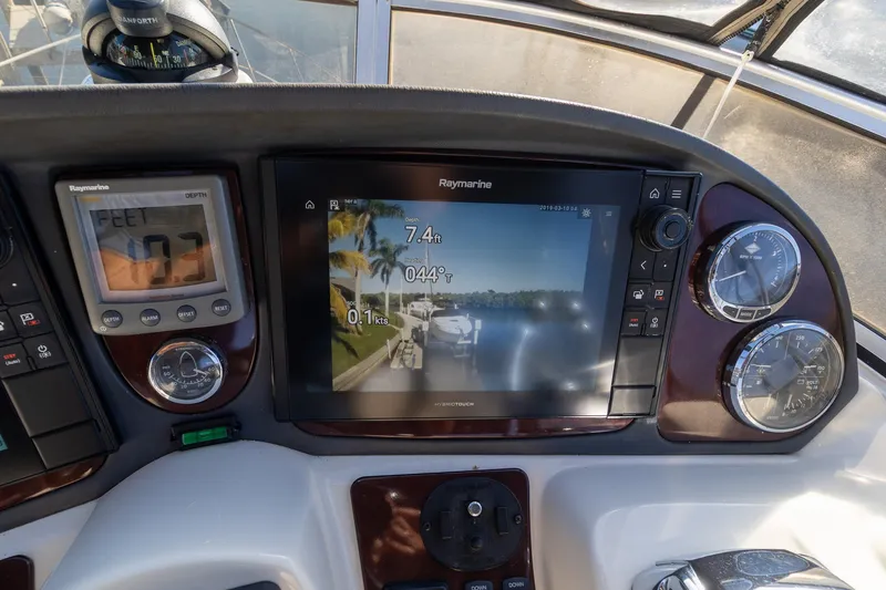 Slide: The Image of 2009 Meridian 391 Sedan dashboard with navigation and depth display. - 15