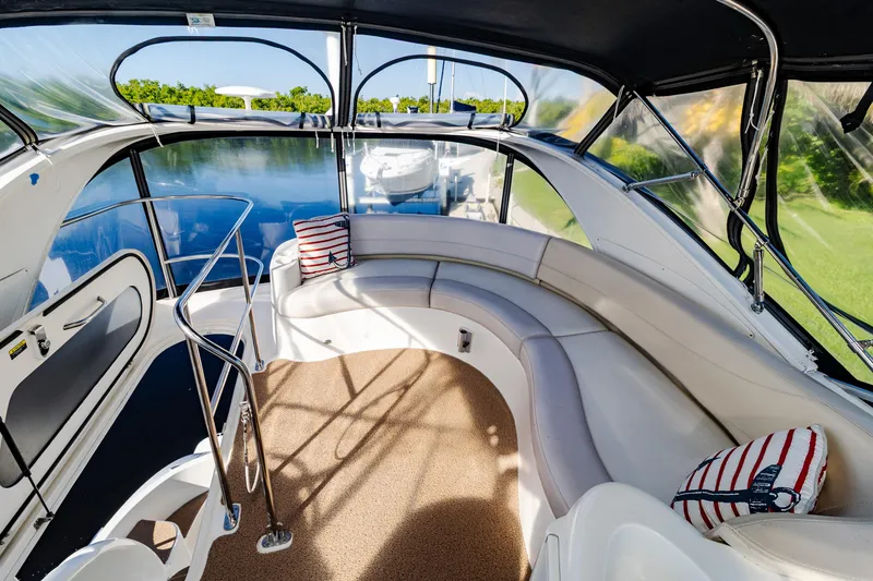Slide: The Image of Luxurious 2009 Meridian 391 Sedan yacht interior with plush seating and nautical decor. - 19