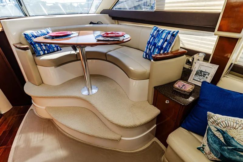 Slide: The Image of Luxurious interior of 2009 Meridian 391 Sedan yacht with elegant seating and dining area. - 21