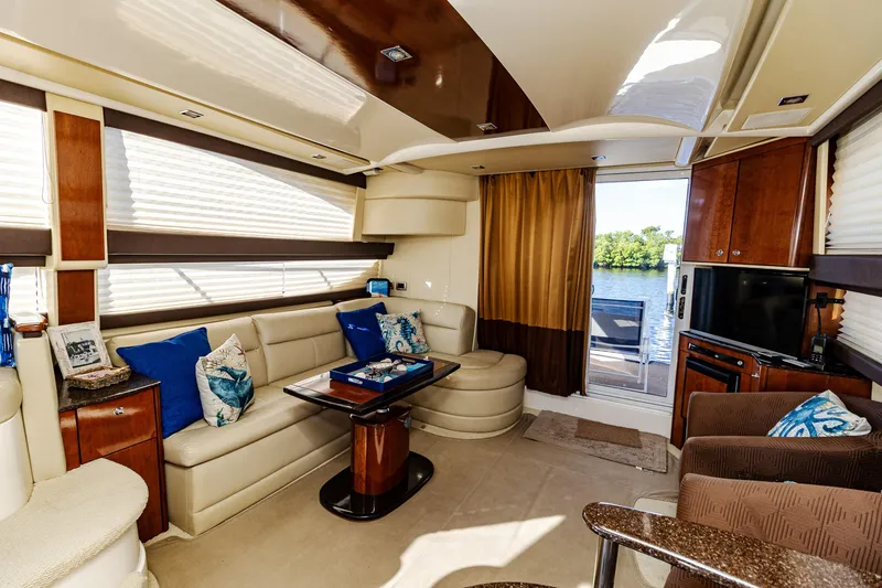 Slide: The Image of Luxurious interior of 2009 Meridian 391 Sedan yacht with elegant seating and scenic water view. - 23