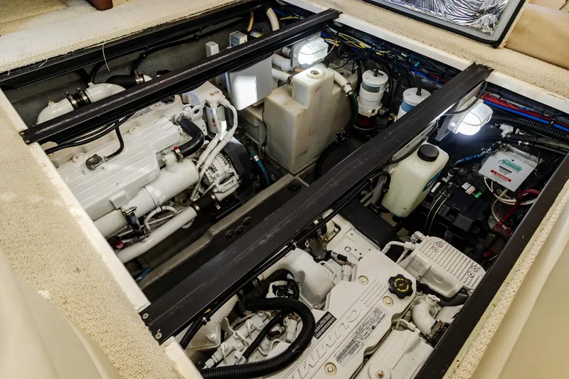 Slide: The Image of Engine compartment of a 2009 Meridian 391 Sedan boat, showcasing mechanical components. - 45